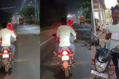गर्लफ्रेंड को आगे बैठाकर बाइक दौड़ाना प्रेमी को पड़ा महंगा.....पुलिस ने लगाया 4000 का जुर्माना....